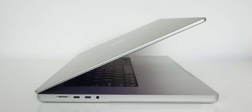 side view of a space grey pre-owned MacBook Pro 16-inch M1